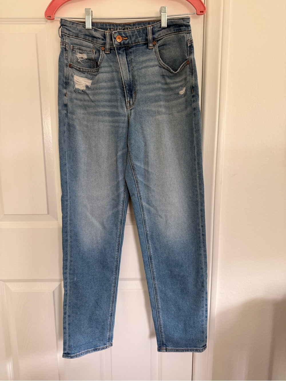 Women’s Light Blue Distressed Mom Jean